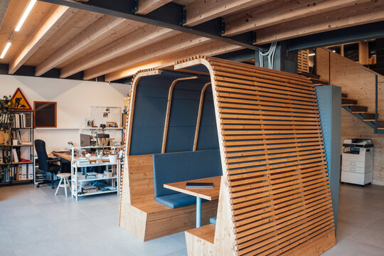 Wooden office cubical at modern workplace