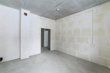 rough repairs for self-finishing. interior decoration, bare walls of the room, stage of construction