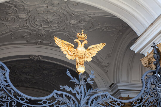 The main gate of the Winter Palace with a gilded double-headed eagle. Saint Petersburg, Russia