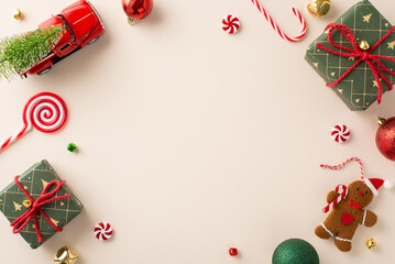 Creative New Year's inspiration. Top view of gifts, red, green, and golden ornaments, gingerbread...