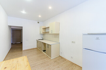 interior apartment kitchen and dining room, refectory area, cooking equipment, table furniture, stove
