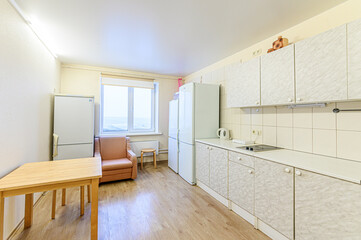 interior apartment kitchen and dining room, refectory area, cooking equipment, table furniture, stove