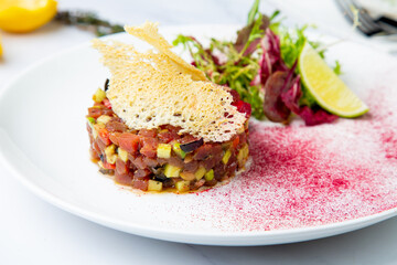 meat salad with arugula and lime, side view