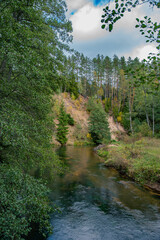 Mančiagirės skardžiai is natural phenomenon in the middle of Lithuanian national park Dzukija, river ūla flowing through the forest and high banks
