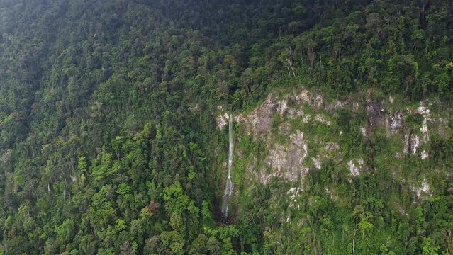 Aerial view of tall Honduras mountain waterfall: Cascada el Bejuco