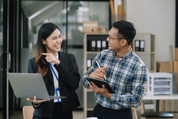 Professional investor working new start up project. Finance managers meeting.using laptop and digital tablet computer in office.