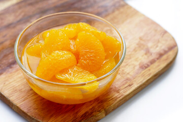 Mandarin orange in sweet syrup - obrazy, fototapety, plakaty