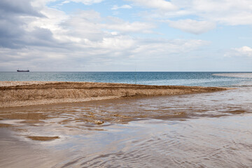 Fototapeta na wymiar Seaside landscape photo with muddy waters of Belbek river