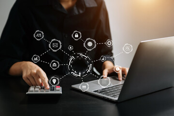 Business report, analysis and planning, Business hand pointing at business document and a tablet, smartphone and laptop displaying financial data with virtual icon