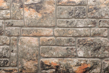 Exterior gray stone brick wall, brick wall texture background. Old vintage brick wall pattern