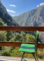 Seat with a view over the hills surrounding Matka Canyon, North Macedonia - obrazy, fototapety, plakaty