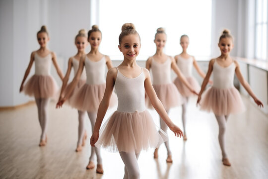 Group of happy smiling girls on ballet class, dancing and rehearsing choreographed dance routine