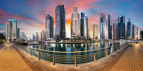 Luxury Dubai Marina canal and promenade in beautiful summer day,Dubai,United Arab Emirates