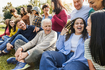 Group of multigenerational people having fun together - Multiracial friends of different ages...