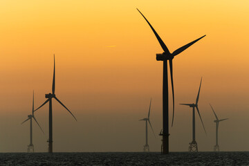 Sunset view of the Offshore wind power systems off the western coast of Taiwan.
