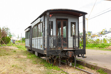 Obraz premium Old retro steam railway train station on sunny day in Da Lat city, Viet Nam