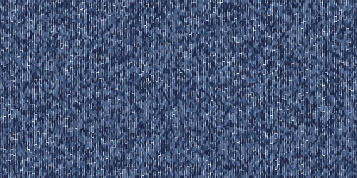 Seamless pattern of distressed indigo denim with vertical threads. Blue textile jeans background with variegated texture. Vector illustration