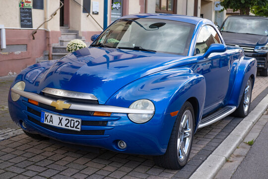 vintage Convertible pickup truck Chevrolet parked on street in city, Retro luxury sports car Super Sport Roadster American company, Oldtimer car, retro-style, Karlsdorf, Germany - October 15, 2023