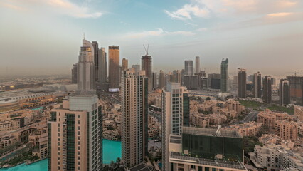 Obraz premium Panorama showing aerial panoramic skyline of a big futuristic city timelapse. Business bay and Downtown