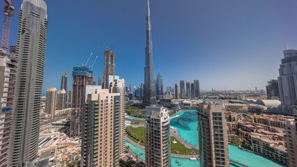 Dubai Downtown cityscape with tallest skyscrapers around aerial all day timelapse.