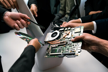Business people holding electronic waste as eco-business recycle waste policy in corporate...