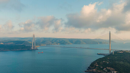 Istanbul, Turkey. The bridge of Sultan Selim Yavuz across the Bosphorus. Sunset time, Aerial View