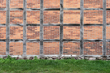 Background with wall made of half-timbered structures and bricks