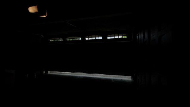 Garage Door Opening Move Down. Inside view footage