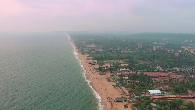Goa, India: Aerial view of Indian summer resort by Arabian Sea, famous Goa Beaches (Sinquerim, Candolim, Calangute and Baga Beach) at sunset - landscape panorama of South Asia from above