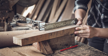 Banner of carpenter hand working on woodworking. measuring wood with ruler and pencil. men at work...
