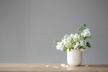 white summer flowers on gray background