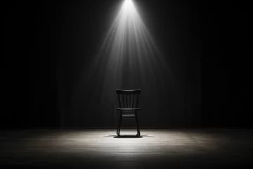 Poster Empty chair in a dark room in the rays of a spotlight. © Vovmar