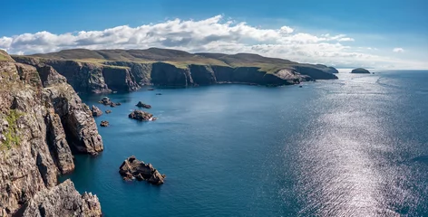 Foto auf Acrylglas Aerial view of the cliffs near the lighthouse on the island of Arranmore in County Donegal, Ireland © Lukassek