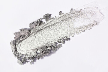 Silver glitter texture close-up.