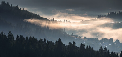 Beautiful sunrise in the picturesque mountains. Picturesque mists rolling in the valleys illuminated by the rays of the rising sun,Pieniny,Poland - obrazy, fototapety, plakaty