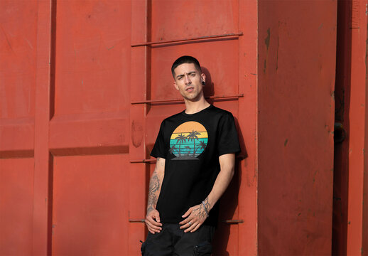 Mockup of man wearing t-shirt with customizable by red ladder