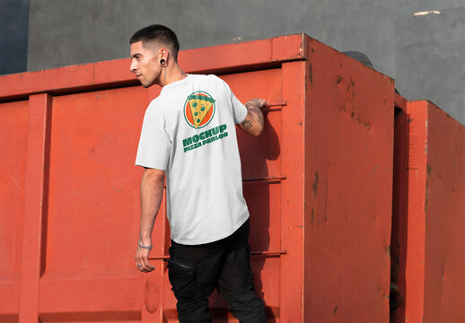 Mockup of man wearing t-shirt with customizable by red ladder