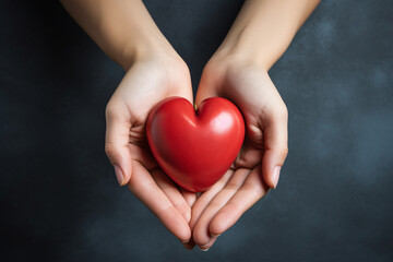 Two hands tenderly holding a vibrant red heart, symbolizing the profound and compassionate connection between individuals in a simple yet powerful gesture of love and care. Ai generated