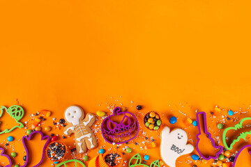 Fototapeta na wymiar Bright colorful Halloween cookies and sweet background