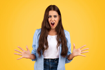 Angry teen expressing frustration, surrounded by a vibrant yellow background