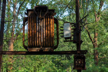 10th October, 2023, Topchachi, Jharkhand, India: Electric tranformer installed inside road side...