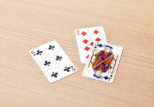 Mockup of three customizable playing cards thrown down