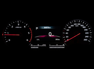 Close up shot of speedometer in car. Car dashboard. Dashboard details with indication lamps.Car instrument panel. Dashboard with speedometer. Car inside