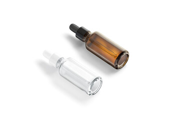 Blank transparent and amber glass dropper bottle mockup, side view