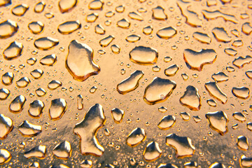 Drops of water on a colored background. Abstract texture