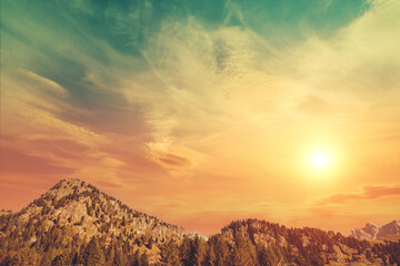 Mountain ridge against sunset sky