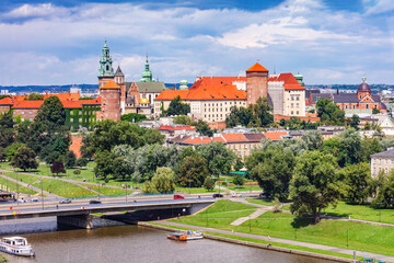 Wawel Royal Castle and Vistula river in Cracow, Poland as seen from Vistulan Boulevards