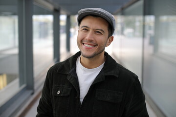 Young Hispanic entrepreneur with a gorgeous smile  - obrazy, fototapety, plakaty