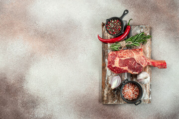 tomahawk steak. Raw beef meat. place for text, top view