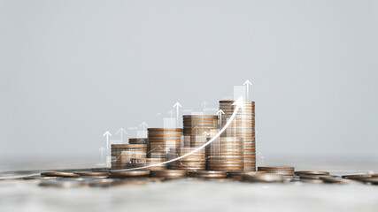 Strategy on a pile of coins with trading charts Finance concept and stock growth, financial...